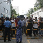 Protests outside parliament as parties face off