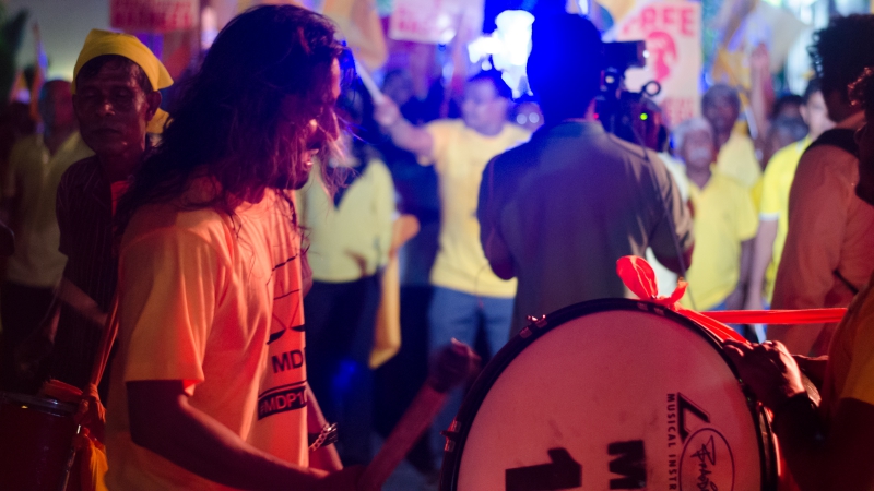 MDP's youth wing leader Azu has a go at drumming.
